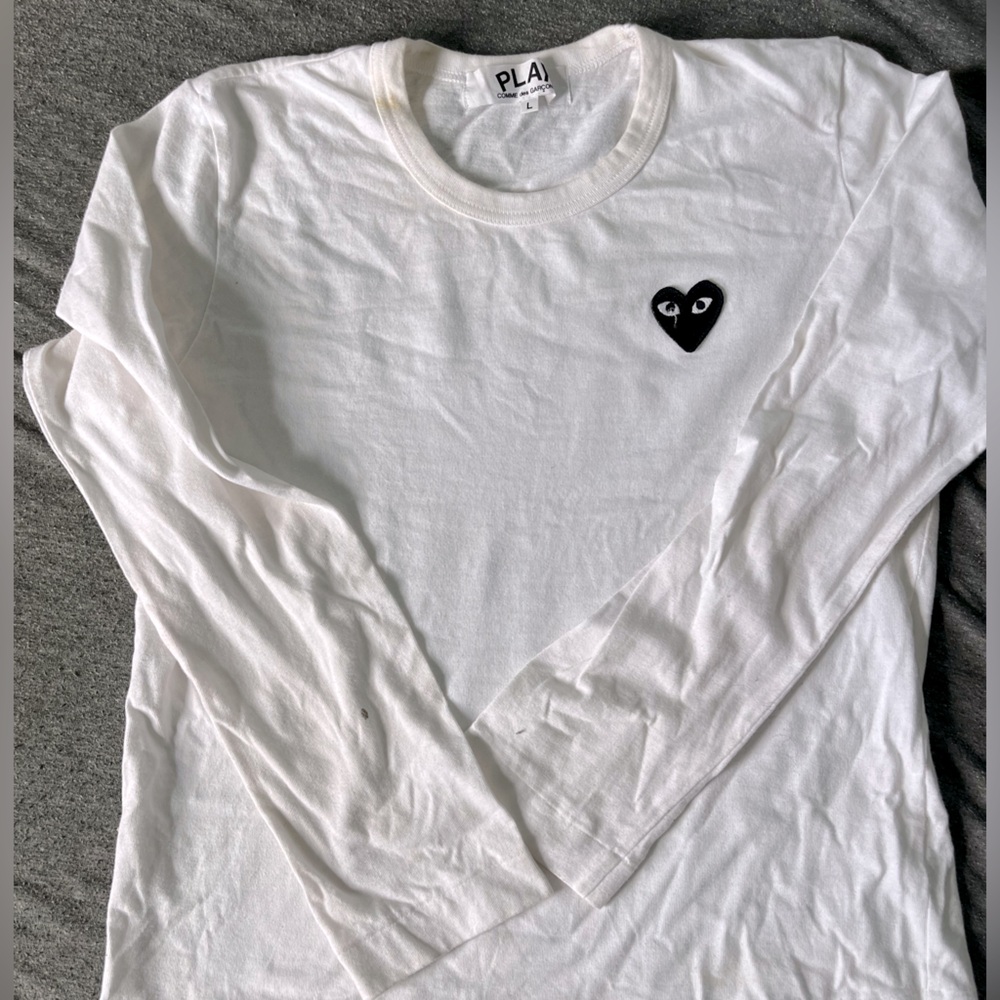 Play COMME DES GARCONS